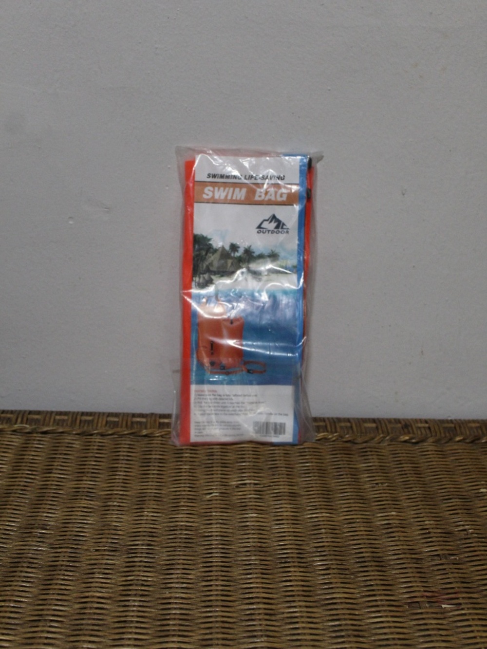 Outdoor swimming life-saving swim buoy and dry bag.